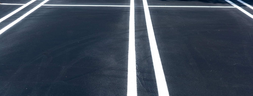 Front view of a newly completed outdoor parking lot