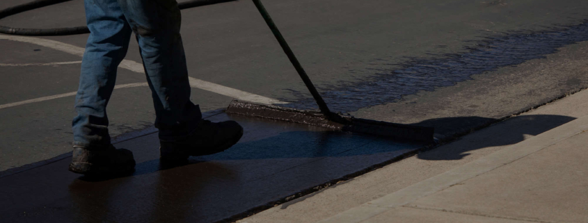 Side view of asphalt being applied