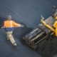 Workers Lay A New Asphalt Coating Using Hot Bitumen